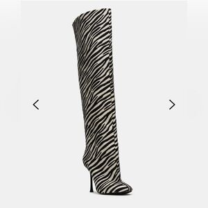 Steve Madden
Alluring Zebra Over The Knee Boots